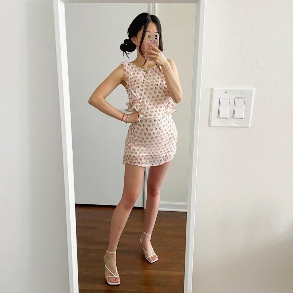 Pomelo dainty floral mini dress with cut out bow-tie sides